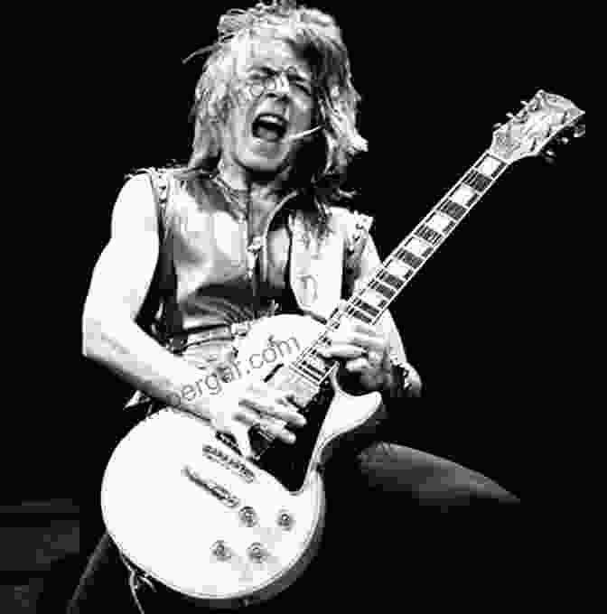 A Black And White Portrait Of Randy Rhoads, Gazing Intensely With His Signature Long Hair And Guitar In Hand Crazy Train: The High Life And Tragic Death Of Randy Rhoads