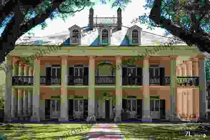 A Large, Stately Plantation House With White Columns And A Wraparound Porch, Surrounded By Lush Green Fields. Behind The Big House: Reconciling Slavery Race And Heritage In The U S South (Humanities And Public Life)